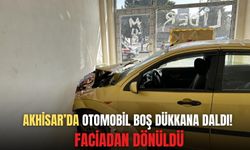 Akhisar’da otomobil boş dükkana daldı! Faciadan dönüldü