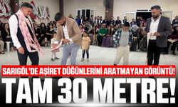 Sarıgöl'de 30 metrelik takı düğüne damga vurdu!