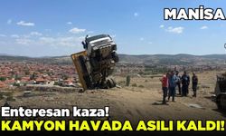 Kula'da hafriyat kamyonu havada asılı kaldı