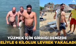 Yüzmeye giden adam 6 kiloluk levrek yakaladı