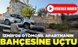 İzmir'de otomobil apartmanın bahçesine uçtu: 2 yaralı