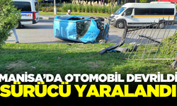 Manisa'da devrilen otomobilin sürücüsü yaralandı