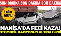 Manisa'da kamyonun altına giren otomobilin sürücüsü yaralandı