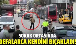 Sokak ortasında kendini bıçakladı