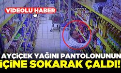 Şüphelinin ayçiçek yağını çalması ise güvenlik kamerası tarafından saniye saniye görüntülendi