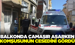 Çamaşır asarken komşusunun cesedini gördü