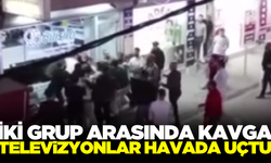 İki grup arasında kavgada televizyonlar havada uçtu