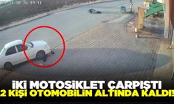 Motosikletlerin çarpıştığı kazada 2 kişi otomobilin altında kaldı!