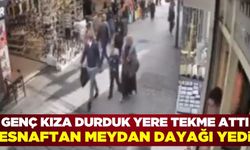 İzmir'de yolda yürüyen genç kıza tekme atan adam, esnaftan meydan dayağı yedi!