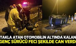 Bursa'da takla atan otomobilin altında kalan genç hayatını kaybetti