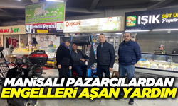 Manisalı pazarcı esnaflardan engelli bireye anlamlı hediye